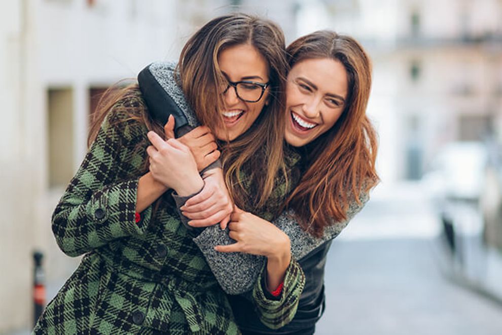 individual-hero-m two women hugging